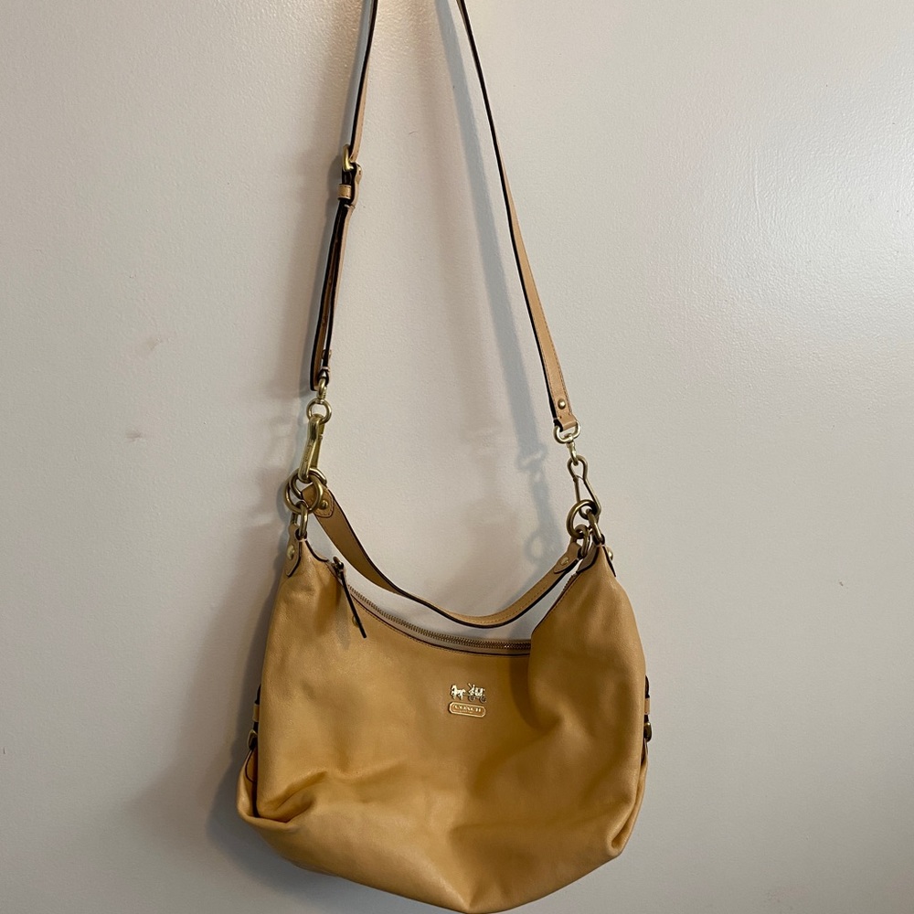 Coach. Coach Madison Hailey. Apricot color leather purse.